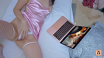 Young Woman Reaches Orgasm While Pleasure Herself With Pornography